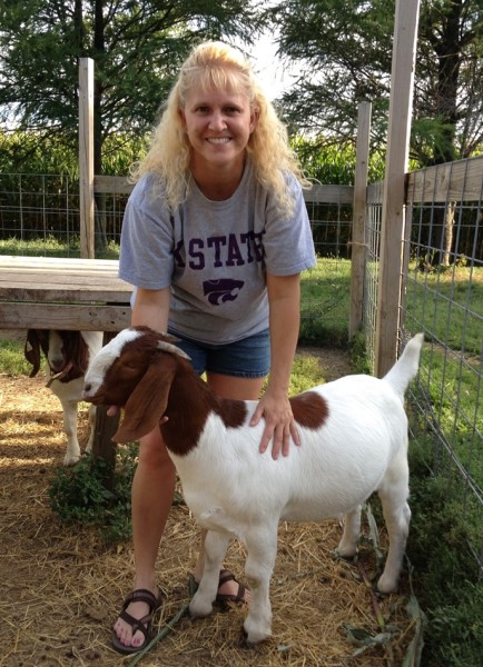 Sharlie with a goat.